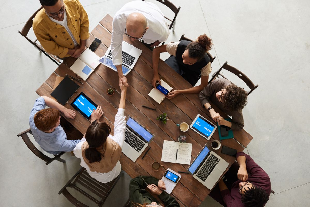 AI-augmented development team collaborating on code